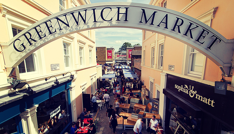 Greenwich Market stalls with colourful goods